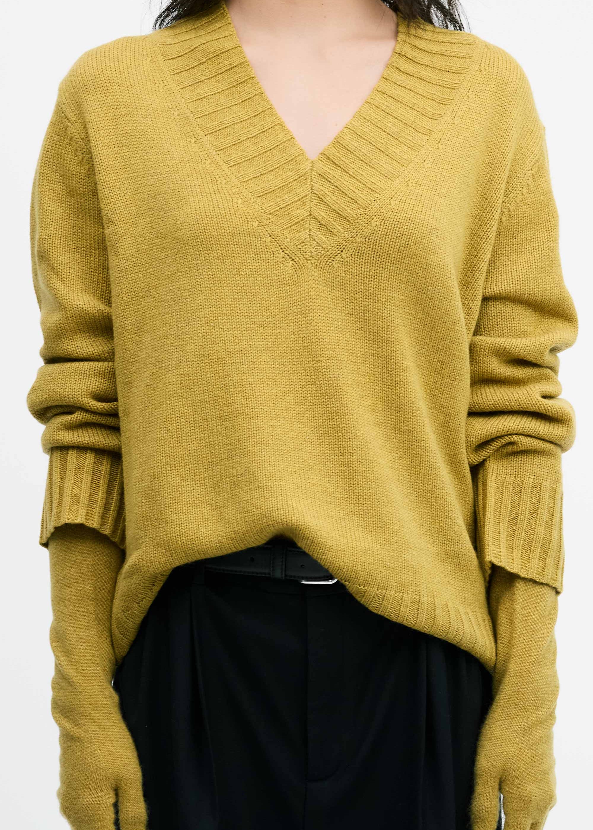 Model wearing the Cashmere V-Neck Knit in Chartreuse and gloves
