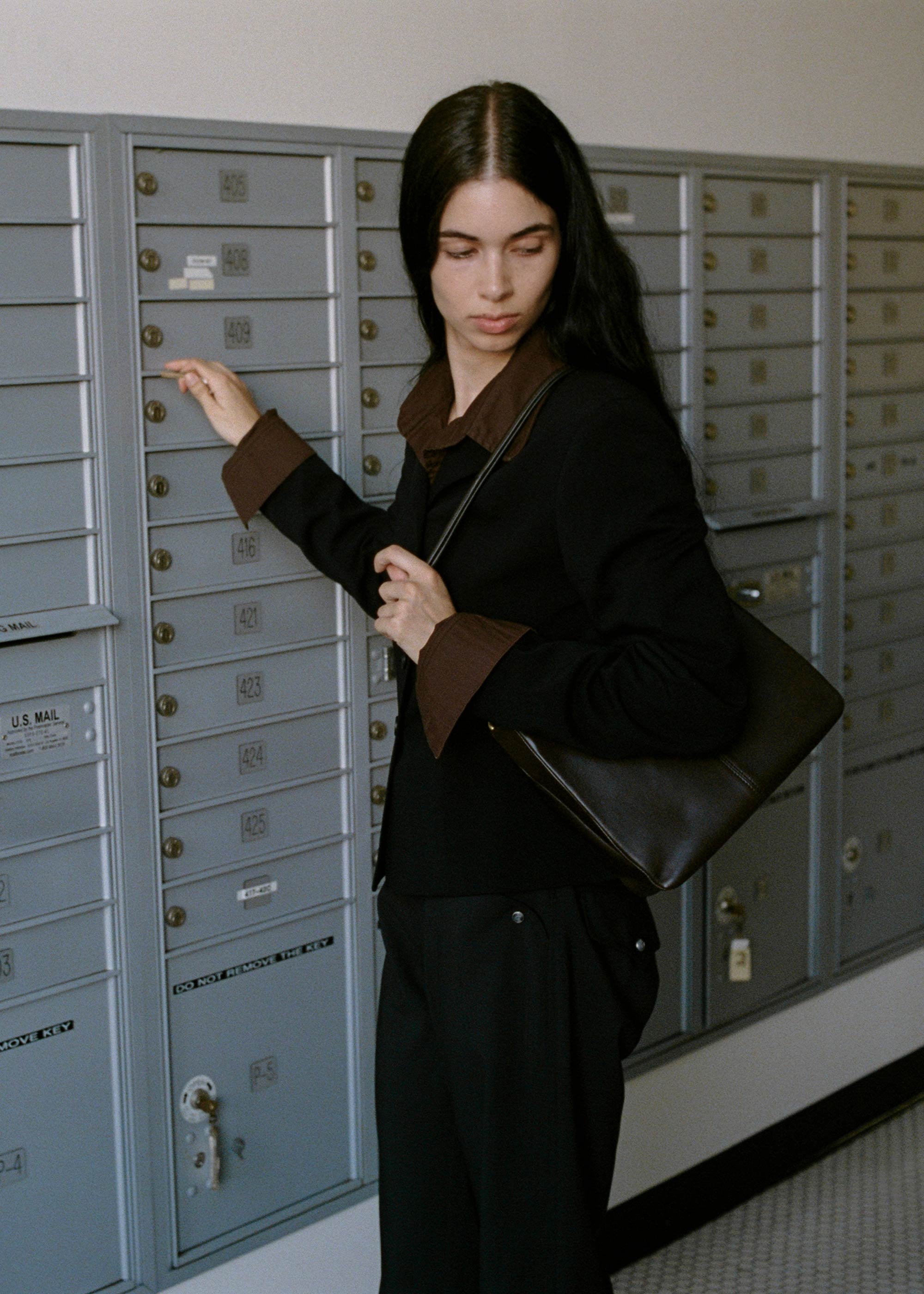 Joan Bag in Americano Lambskin worn on the shoulders, photographed by Jane Dylan Cody in LA