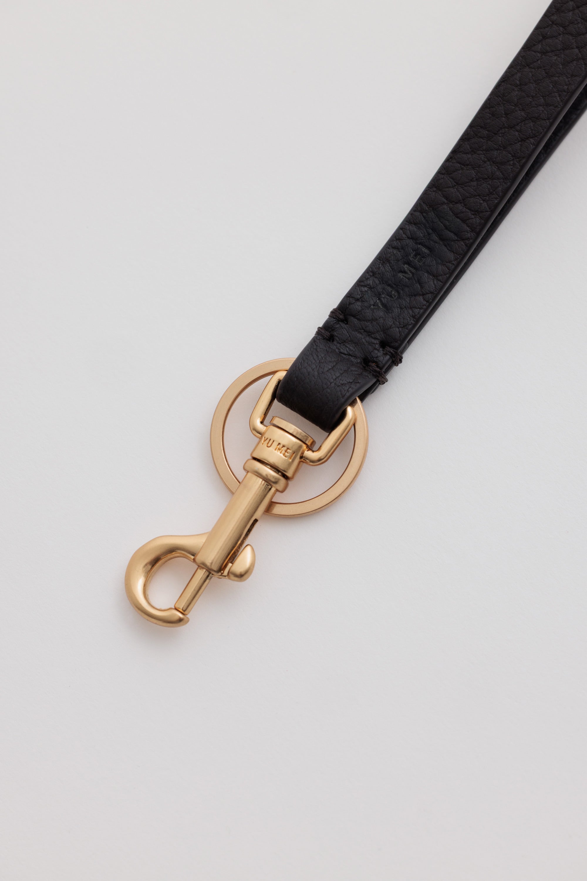Key Fob in Americano Deer Nappa detail view showing solid brass key ring and custom Yu Mei snapper