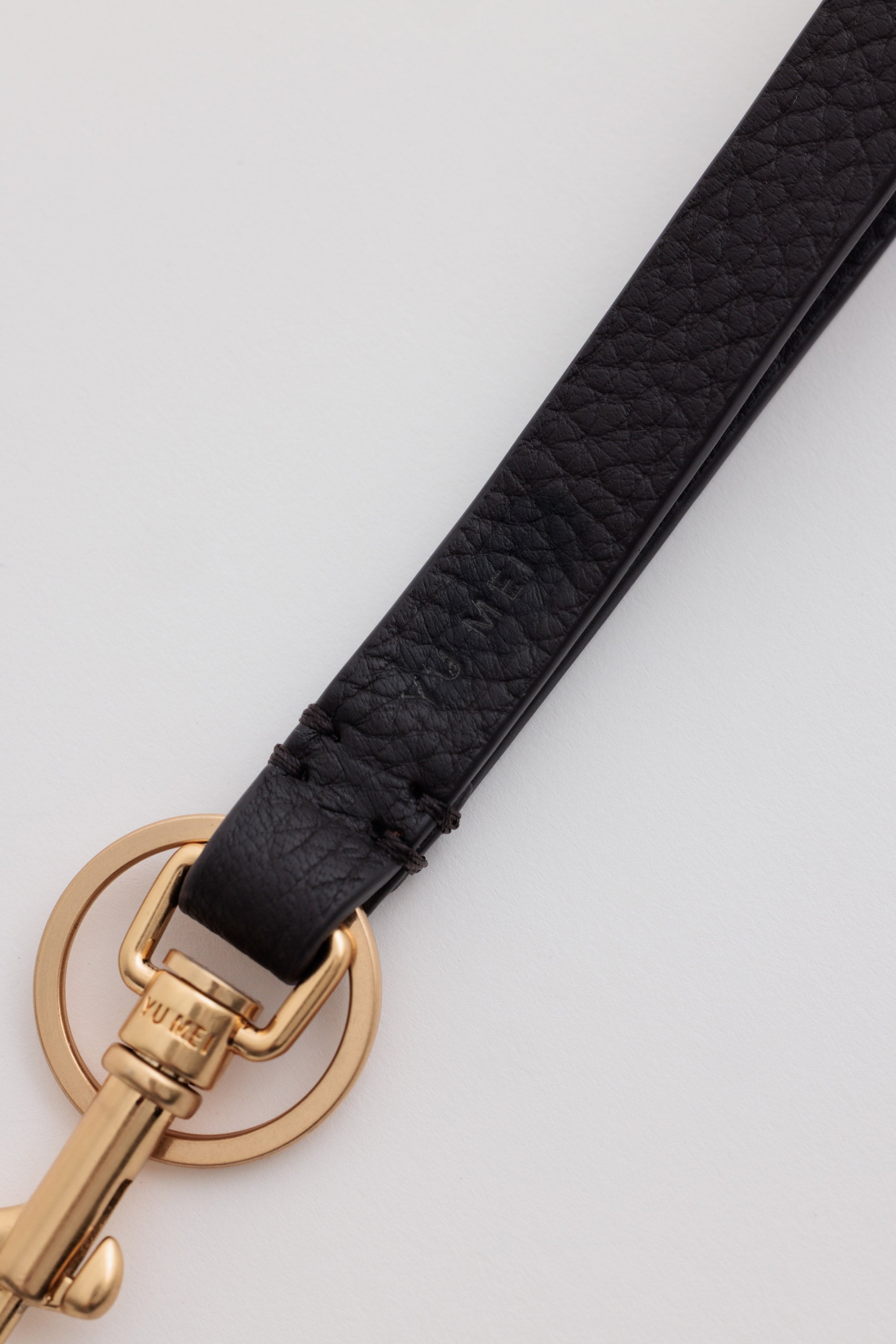 Key Fob in Americano Deer Nappa detail view showing custom Yu Mei snapper