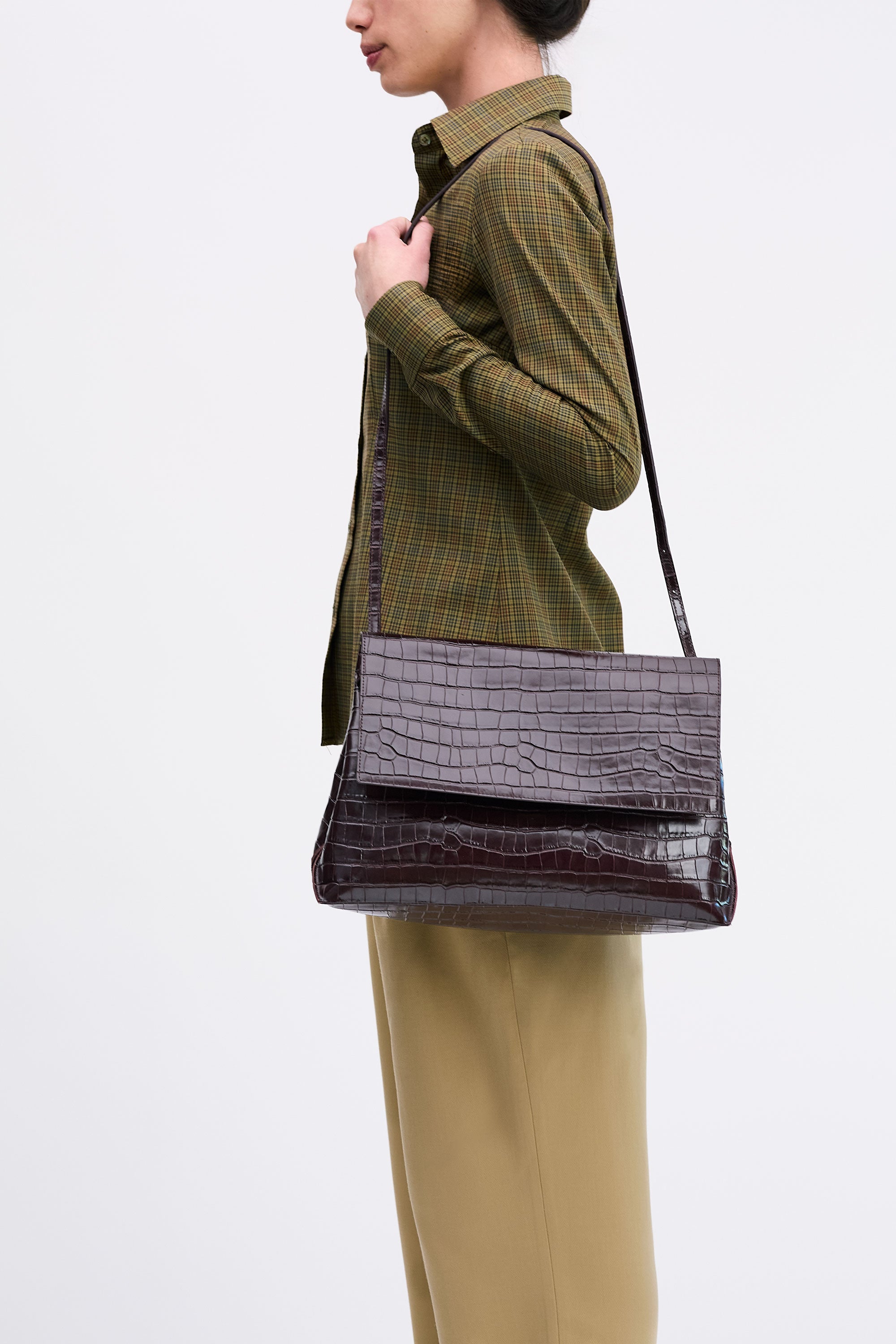 Pania Bag in Fire Croc worn on shoulder of model wearing check shirt and tan pants
