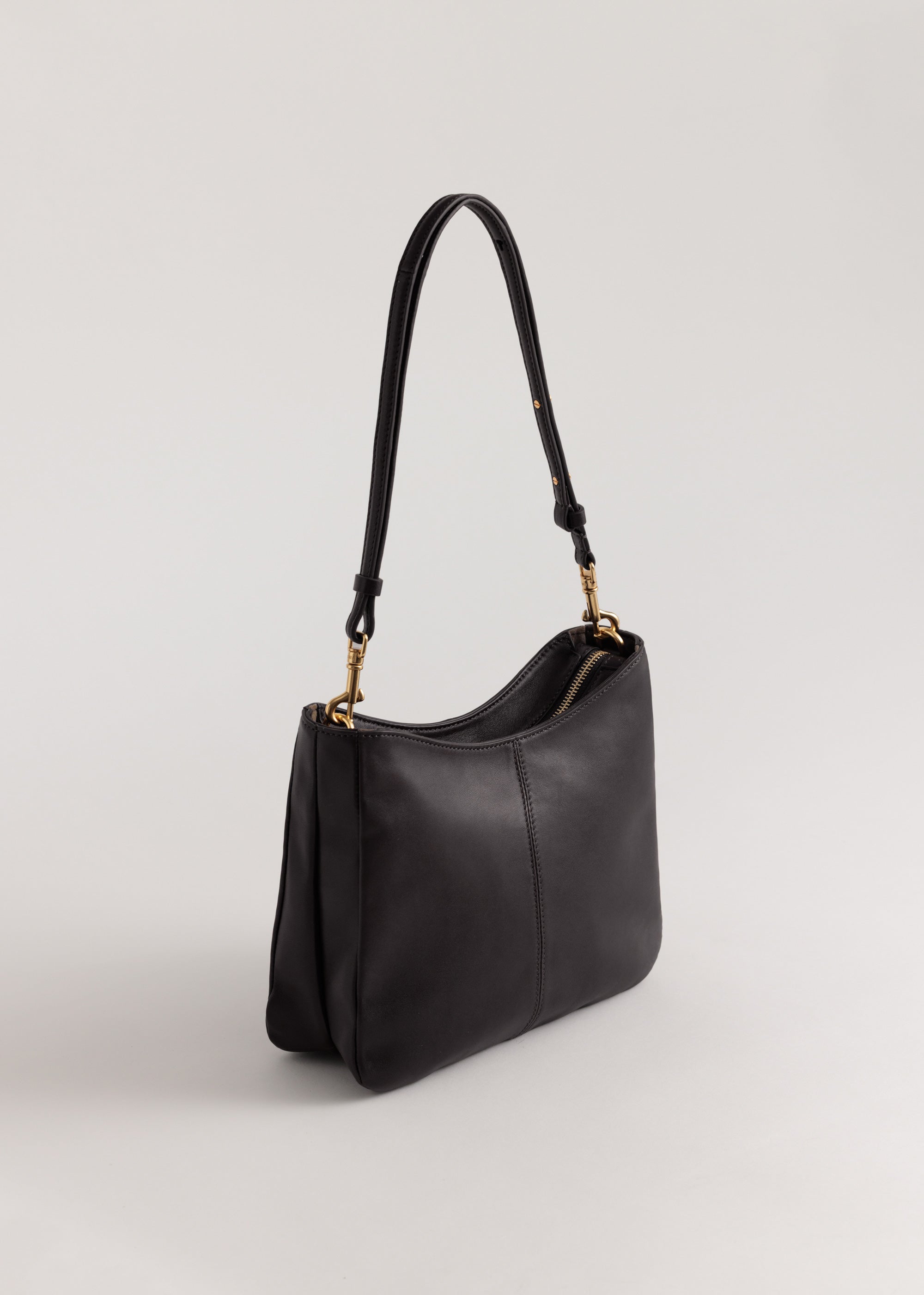 Joan Bag in Americano Lambskin angle view showing twin panelling and adjustable cross-body strap
