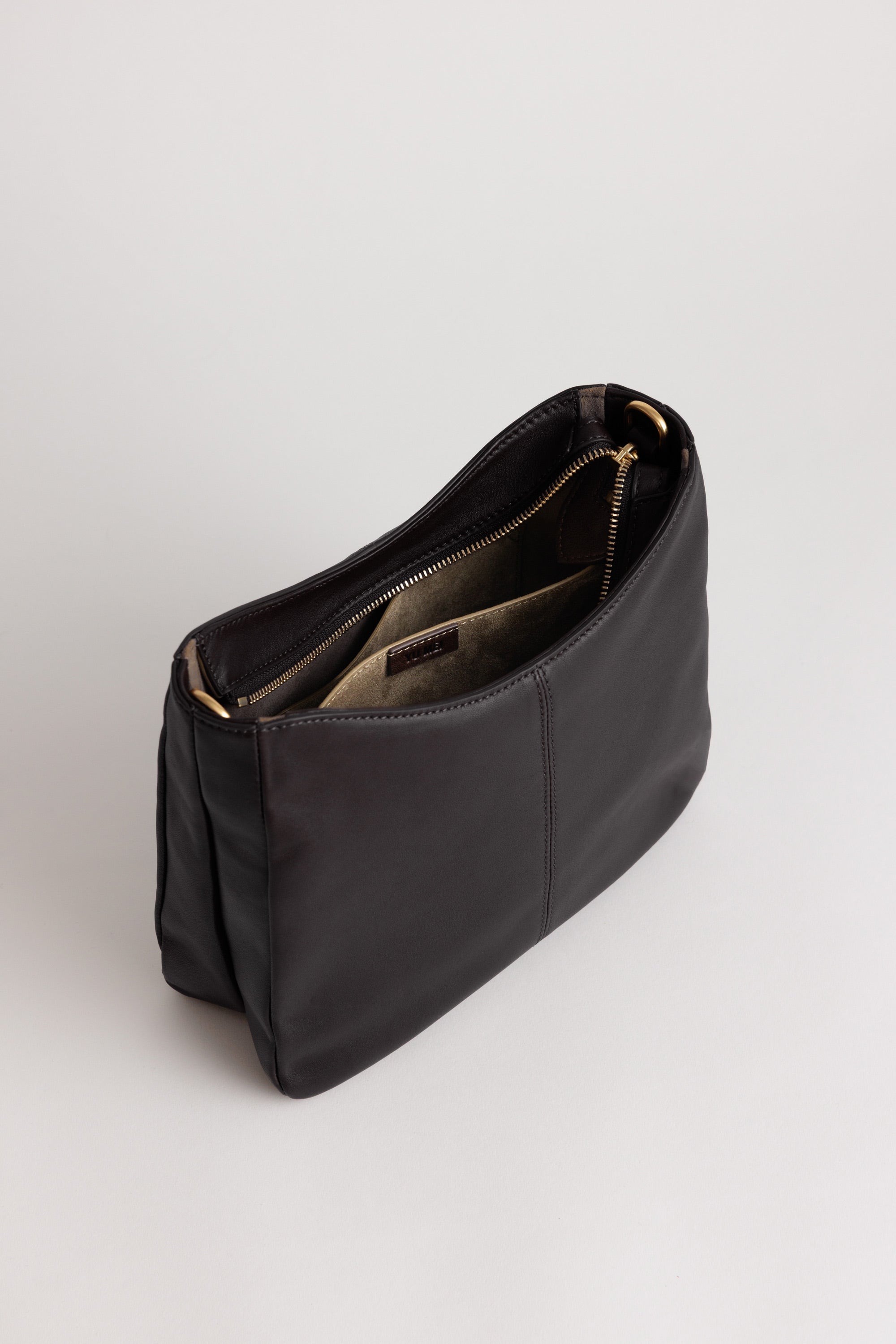 Joan Bag in Americano Lambskin internal view showing recycled suede lining and internal bag divider