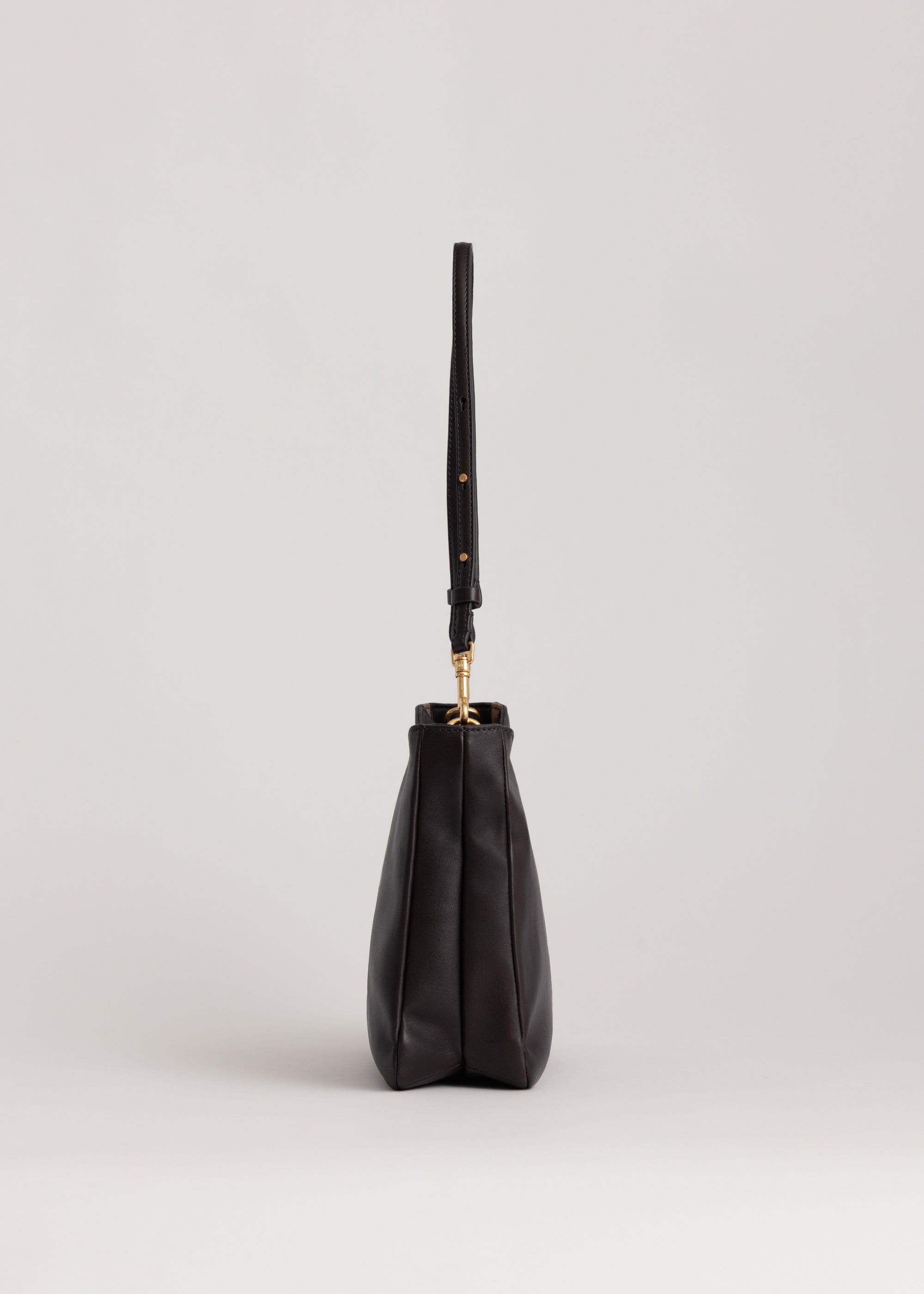 Joan Bag in Americano Lambskin side view showing adjustable cross-body strap