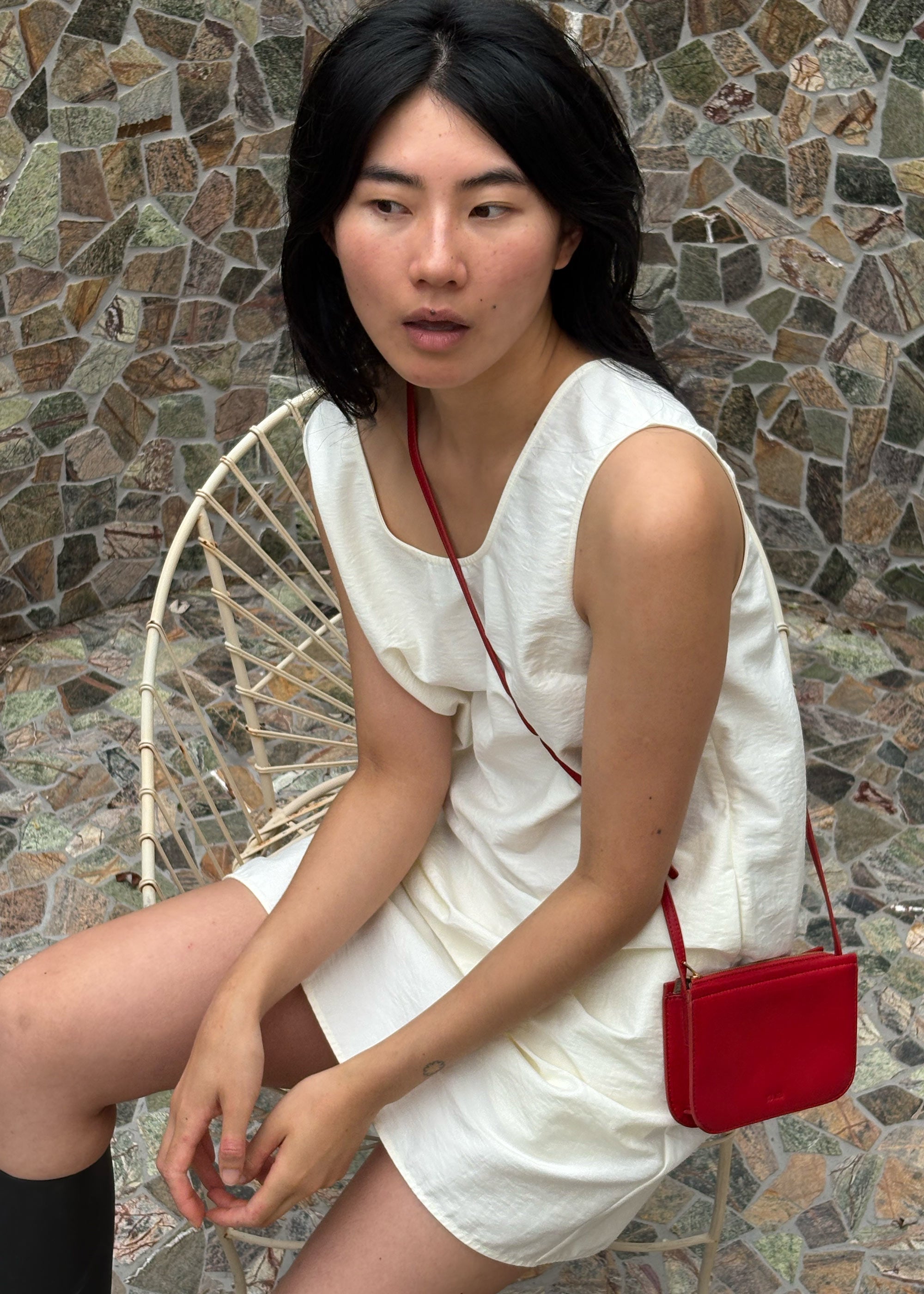 Vi Bag in Lobster Red Lambskin worn crossbody close -p shot