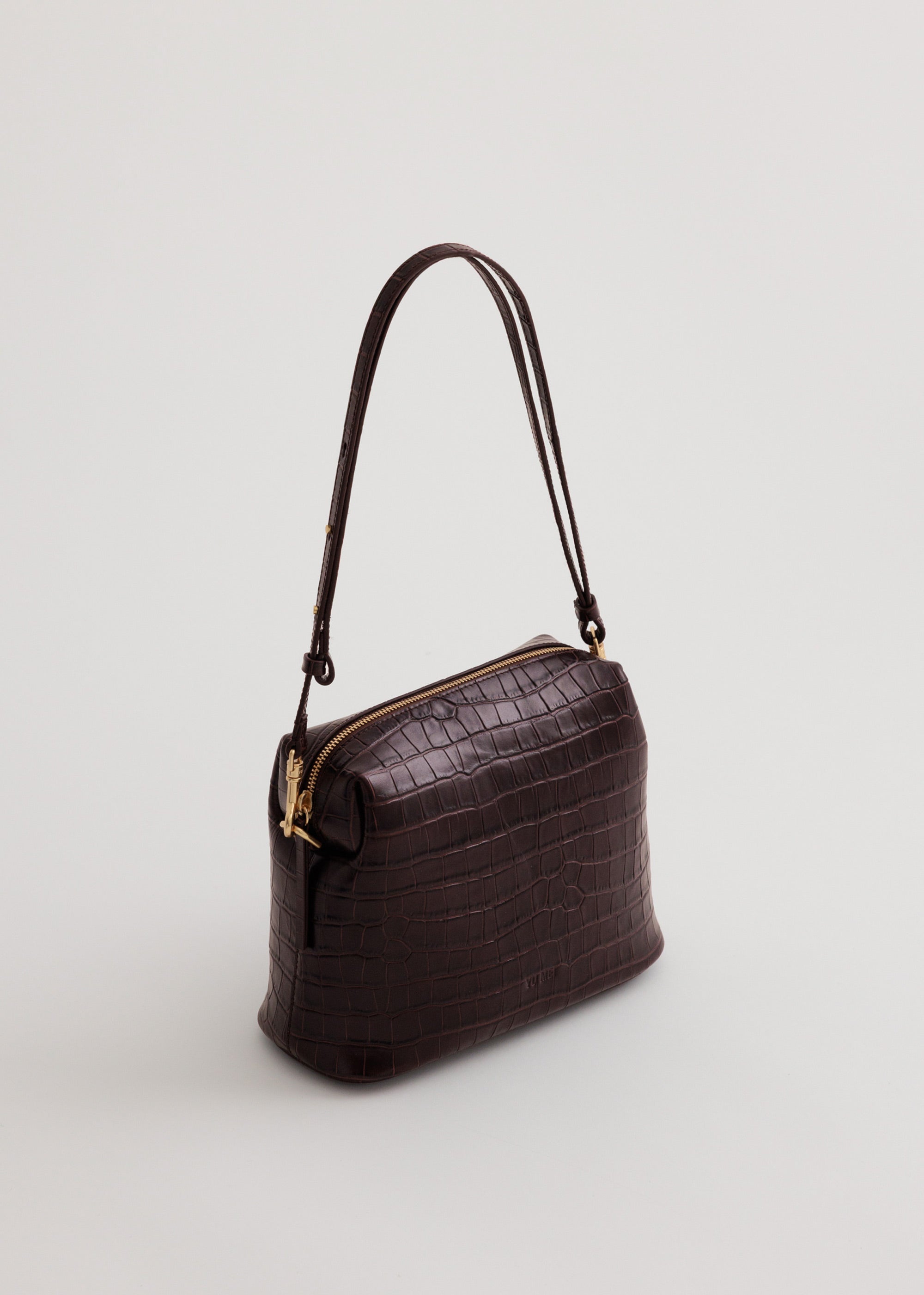 Ch'lita Bag in Fire Croc, 45 degree view, showing adjustable strap at shoulder length