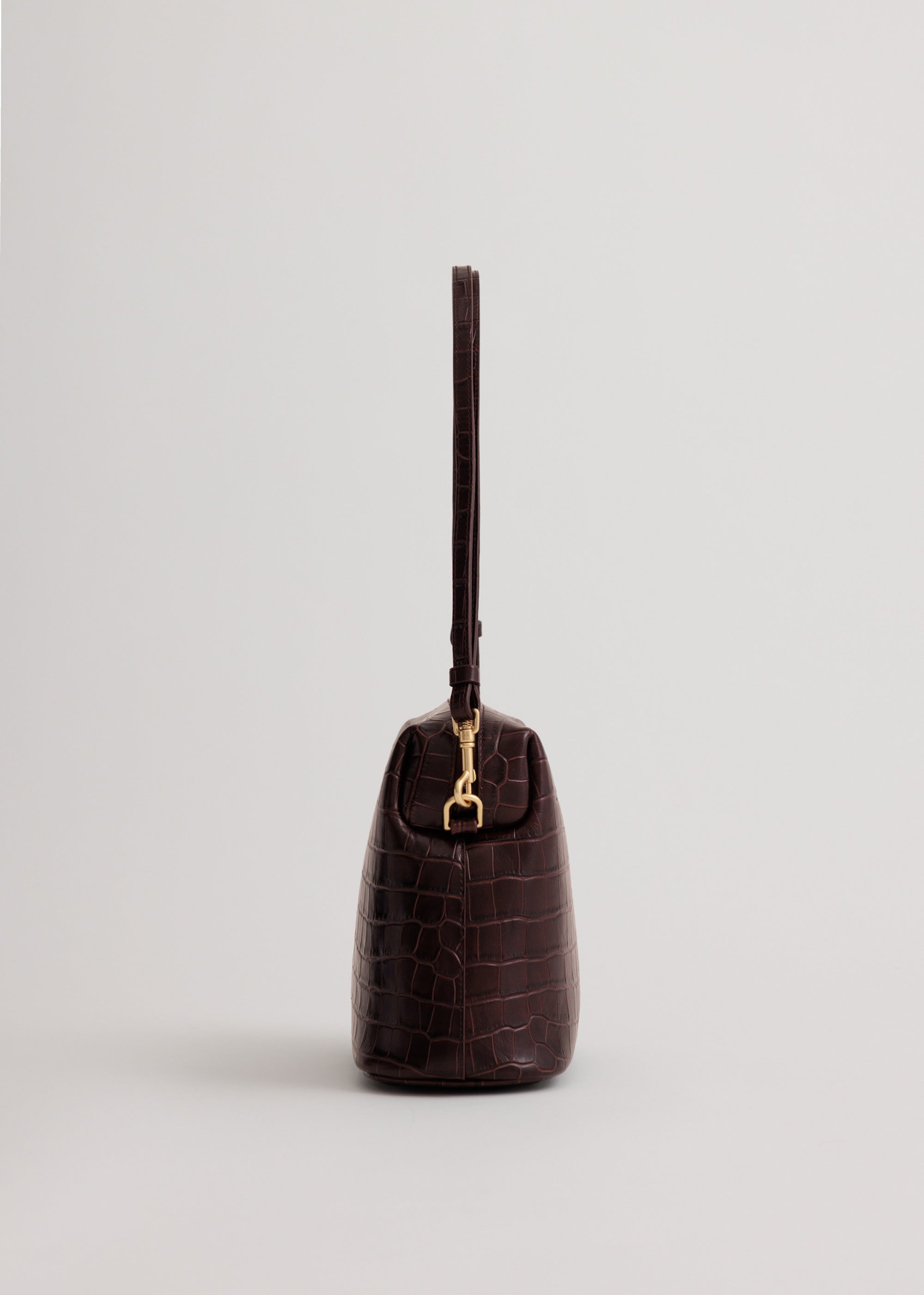 Ch'lita Bag in Fire Croc, side view showing adjustable strap to be worn over shoulder or cross-body