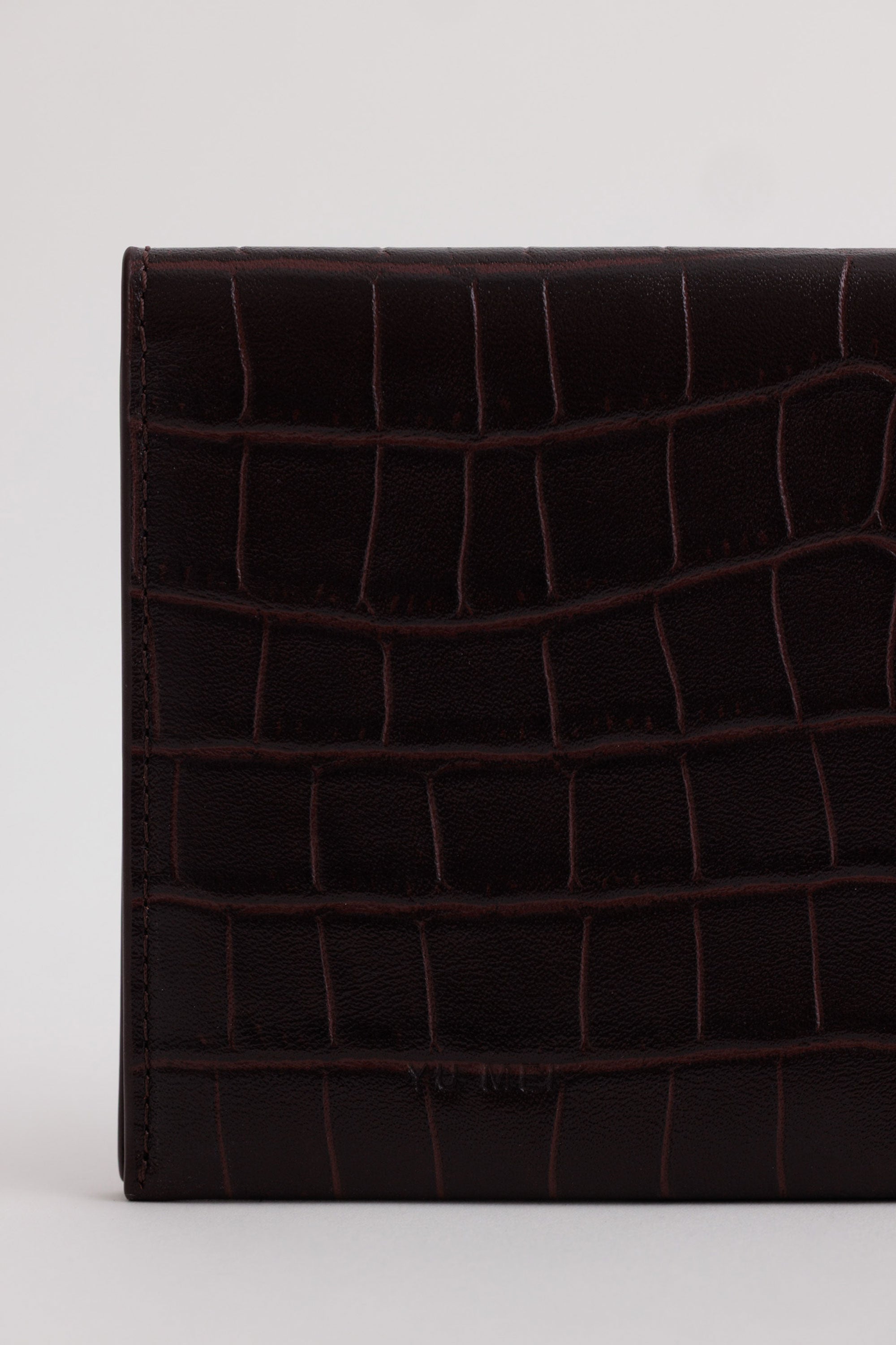 Jessie Folio in Fire Croc close-up view showing premium croc embossed exterior