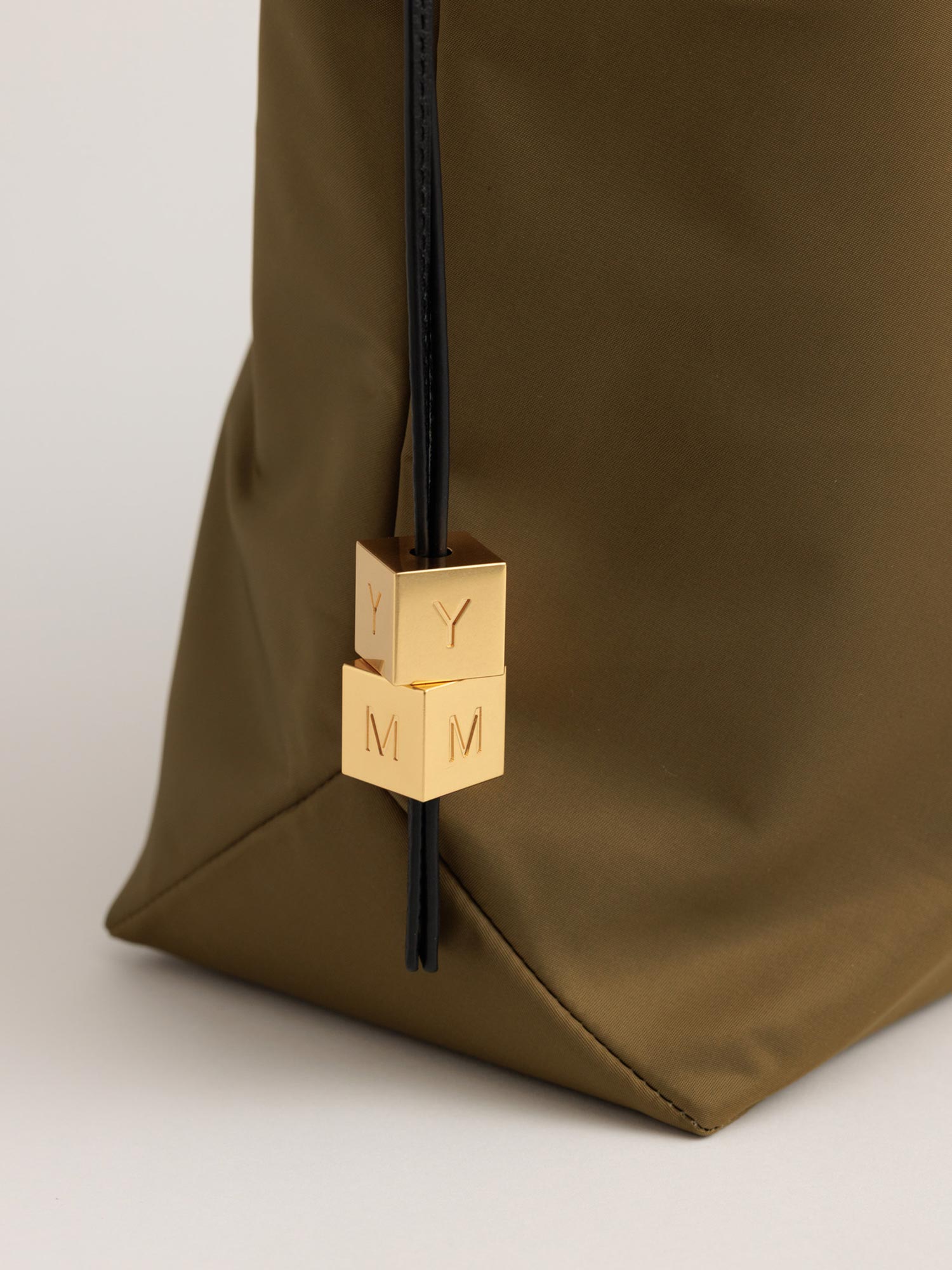 Close up of brass charms