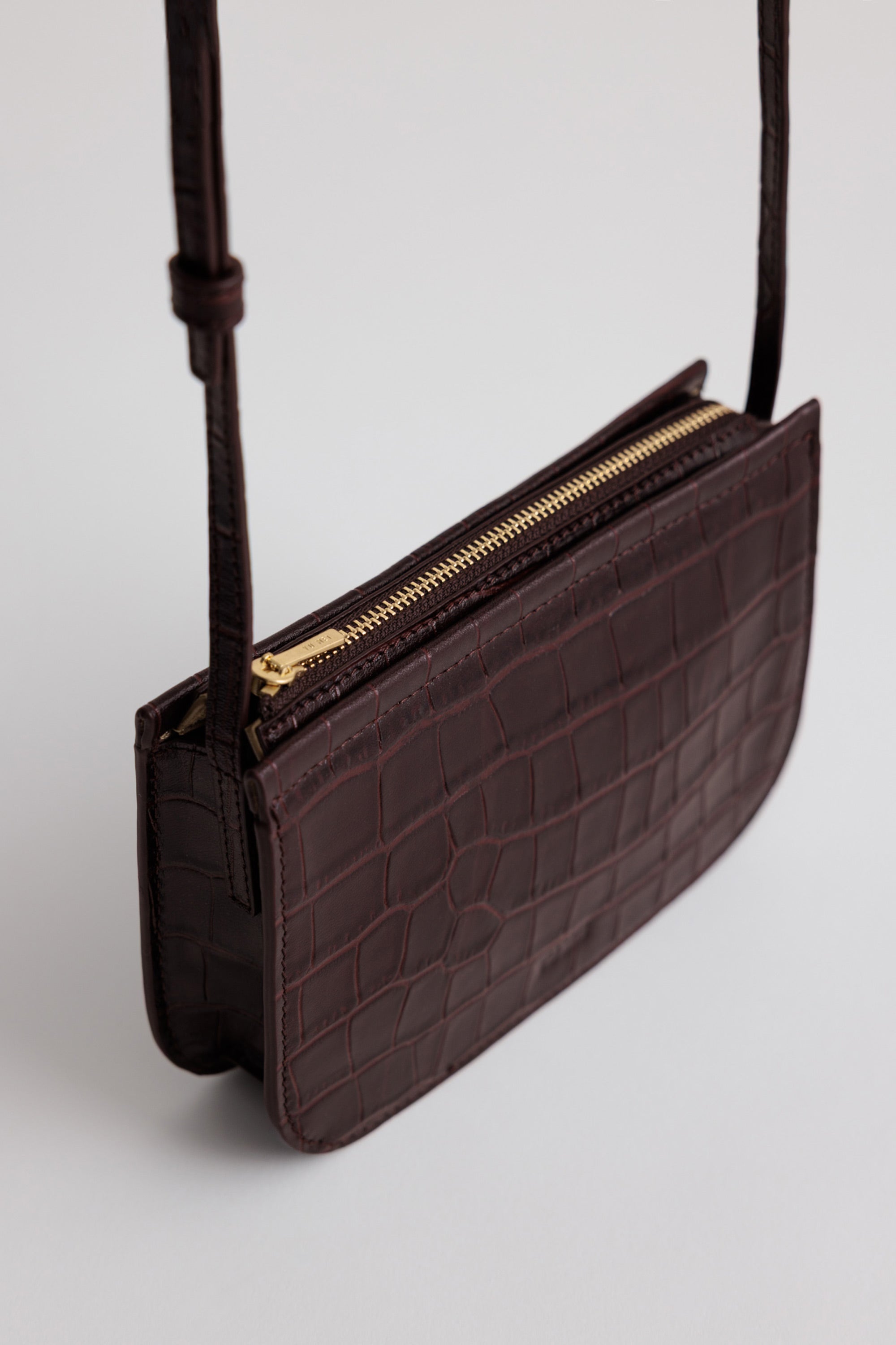 Vi Bag in Fire Croc angle view showing Yu Mei branded YKK zip closure
